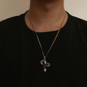 Retro titanium steel necklace with detailed dragon pendant on two-tone gold and silver chain