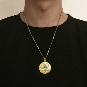Two-tone titanium steel necklace with gold rune pendant and green stone for men