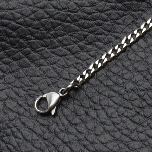 Collier gourmette bicolore en acier titane poli avec fermoir mousqueton pour hommes