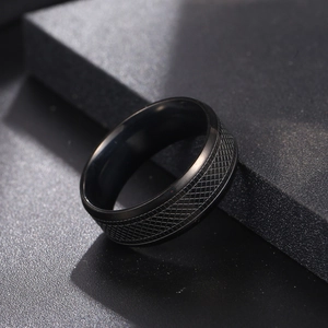 Men's titanium steel ring featuring dark grid snakeskin texture in matte black finish