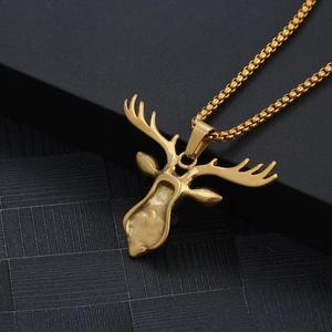 Golden stainless steel necklace featuring a turquoise deer head pendant with box chain