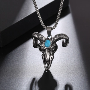 Retro punk goat skull necklace in vintage silver steel with a blue turquoise gemstone