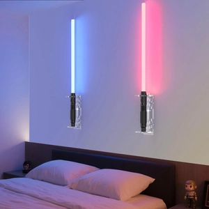 Modern wall-mounted vertical display for dual glowing lightsabers with star-patterned acrylic