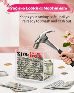 Action shot of breaking a transparent $10k smash box acrylic money jar with a hammer