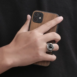 Vintage gothic titanium steel double snake ring for men featuring a black gemstone inlay