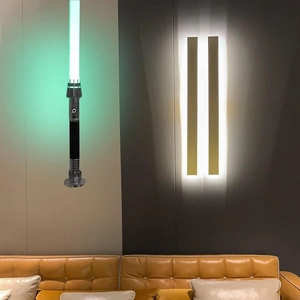 Wall-mounted acrylic lightsaber display rack with glowing green laser sword collectible