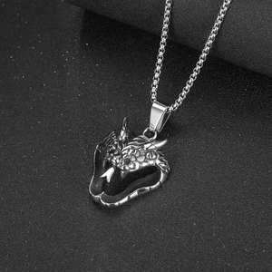 Gothic silver stainless steel snake head pendant with detailed scales on box chain