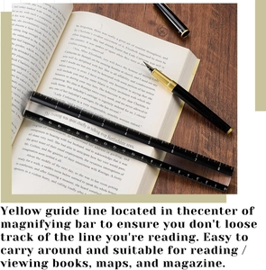 Acrylic magnifying ruler with yellow guiding line on a book for precision reading