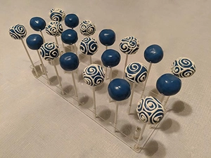 Detailed top view of 21-hole clear acrylic cake pop display stand with lollipop inserts