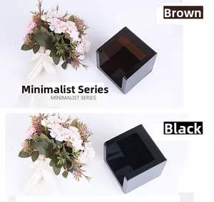 Minimalist square black and amber acrylic tissue box with sleek U-shaped opening detail
