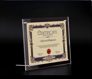 Macro shot of double-layer acrylic certificate frame with four metal support standoffs