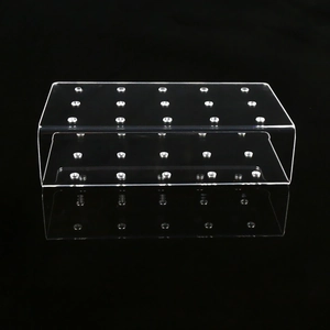 Macro shot of 15-20 hole transparent acrylic lollipop stand with reflective surface