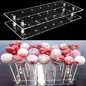 Clear acrylic 21-hole lollipop display stand for weddings and desserts shown with cake pops