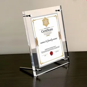 Modern A4 acrylic photo frame with polished metal screws on elegant dark wood surface