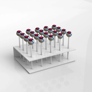 20-hole acrylic lollipop display stand with red and white poke-ball style cake pops