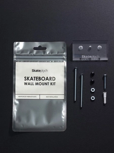 Detailed set of acrylic skateboard wall mount with screws and installation accessories