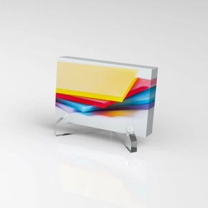 Vertical acrylic business card holder with colorful abstract art and clear display stand