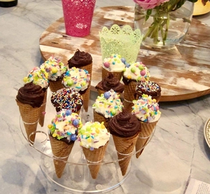 Top view of a 12-hole clear acrylic ice cream cone holder for party snack display