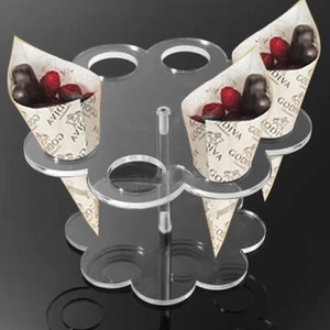 Detail view of the 8-hole clear acrylic ice cream cone stand with double-layer petal trays