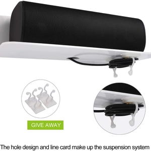 White floating shelf for speakers with integrated cable management and wall mount hooks