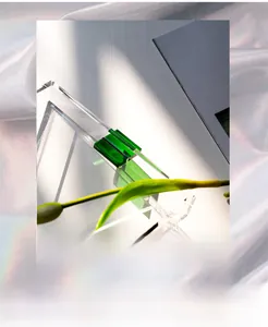 Macro detail of acrylic tray with green handle showing light refraction and shadows