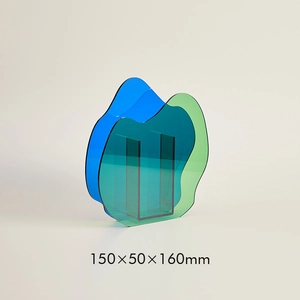 Close-up of blue and green acrylic vase detailing 150x50x160mm dimensions and design