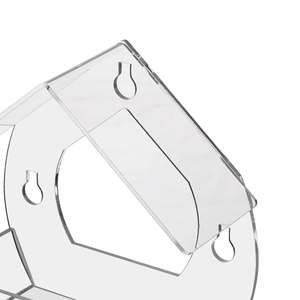 Detailed view of clear acrylic bird feeder with triangle hanging holes for window mounting