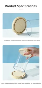 Macro detail of cylindrical acrylic display case with natural wood base and lid