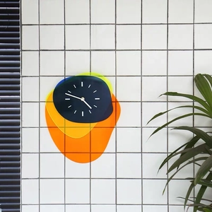 Modern Nordic acrylic wall clock with irregular colorful shapes for living room decor