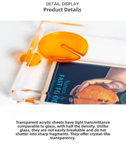 Detail shot of a modern orange acrylic tray showing polished edges and high transparency