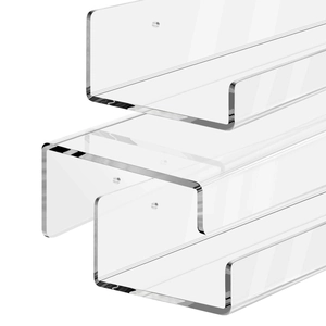 Three-piece clear acrylic floating wall shelves for books and home storage