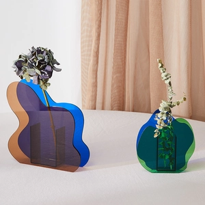 Modern Nordic acrylic geometric flower vases in translucent blue and amber finishes