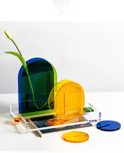 Modern acrylic home decor set featuring colorful arched vases on a clear rectangular tray