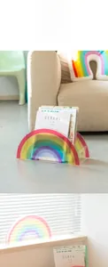 Rainbow acrylic desk organizer for magazines and books featuring a layered nordic design