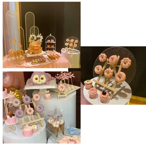 Detailed view of clear acrylic display stand with wooden easel and arch backdrops