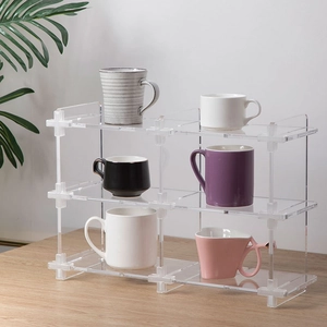 Macro detail of acrylic storage rack showing clear material and secure cross connectors