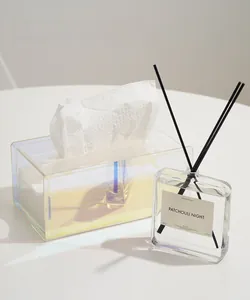 Close-up of modern acrylic tissue box with iridescent finish for minimalist home decor