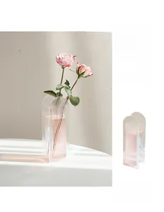 Detailed view of modern ripple acrylic vase with colorful iridescent rainbow plating