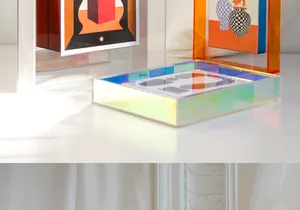 Detail of modern acrylic frames with geometric art and an iridescent laser effect tray