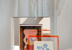 Macro detail of Nordic acrylic frame with colorful geometric patterns and elegant shadows