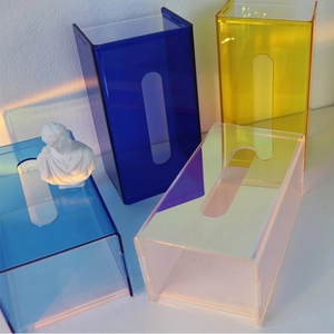 Modern acrylic tissue box showing rainbow iridescent light effects and vibrant colors