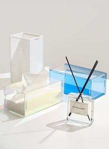 Macro shot showing blue, white and iridescent acrylic tissue box texture and finish