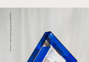 Detail of blue acrylic geometric frame showing material transparency and modern texture