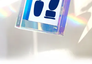 Close-up of iridescent acrylic art frame detail featuring Lagoon Lab side branding