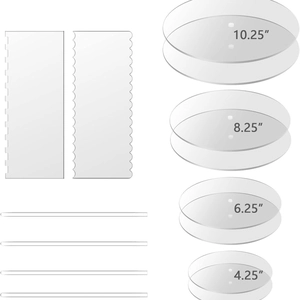 Detailed view of clear acrylic cake disks in four sizes with scrapers and dowels
