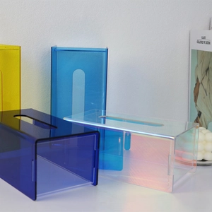 Iridescent acrylic tissue box covers in vibrant colors for modern living room decor