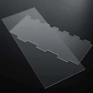 Two-piece clear acrylic cake scraper set with smooth and striped edges for professional baking