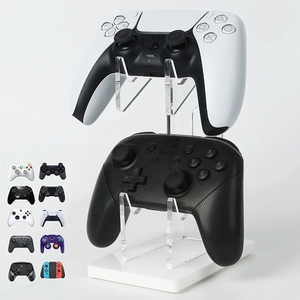Dual-tier transparent acrylic game controller stand with a stable white base for desk storage