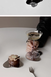 Close-up of irregular acrylic mirror coaster with reflective surface for luxury decor