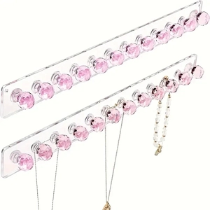 2er Set Wand-Schmuckhalter aus Acryl mit rosa Kristallhaken für Halsketten